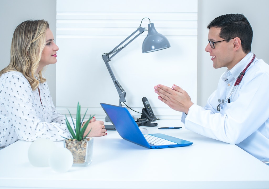 Doctor observing a patient at Safe Space Clinic