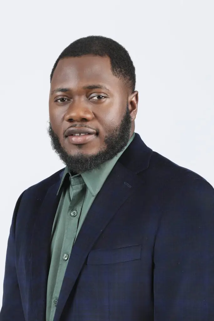 Dr. Ferdinand Akoko, DNP, APRN, PMHNP-BC, professional headshot in suit